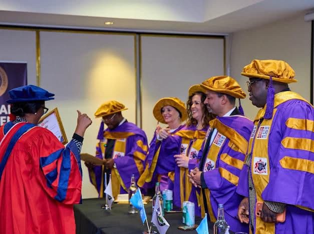 Honorary doctorate ceremony in academic regalia